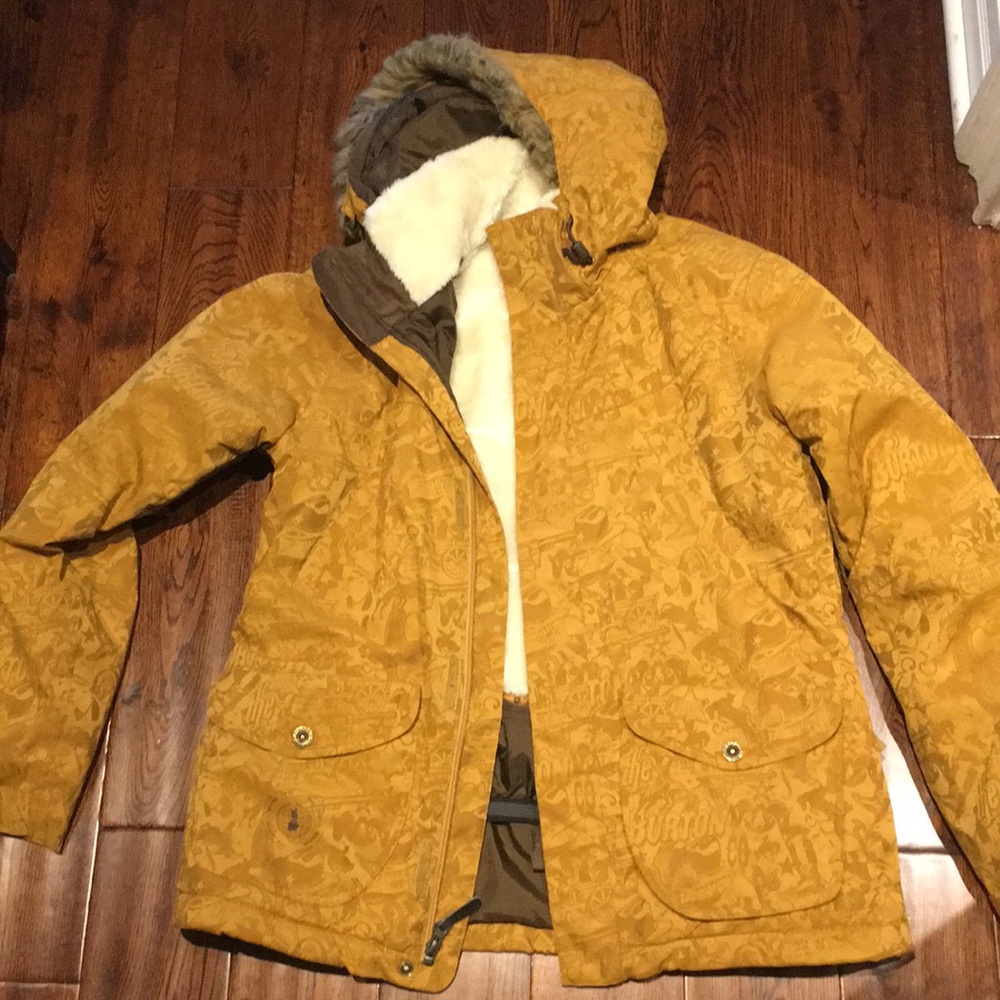 Burton yellow ski or snowboard jacket.